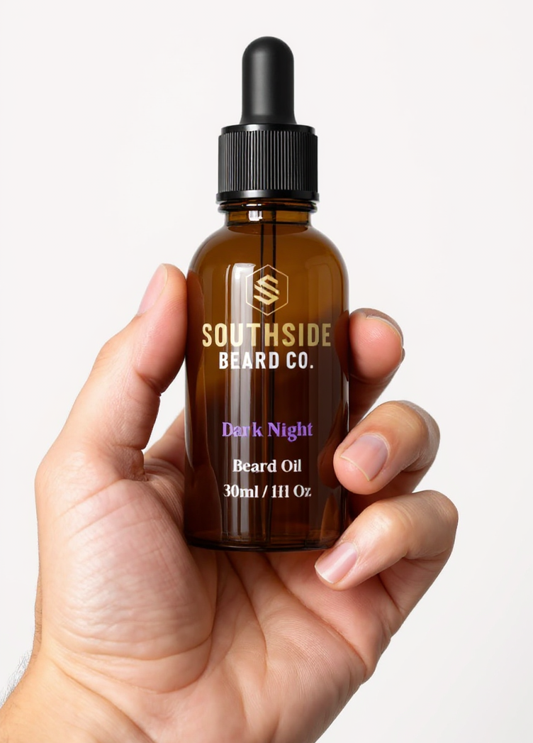 Hand holding a Southside Beard Co lavender and vanilla scented beard oil bottle against a white background